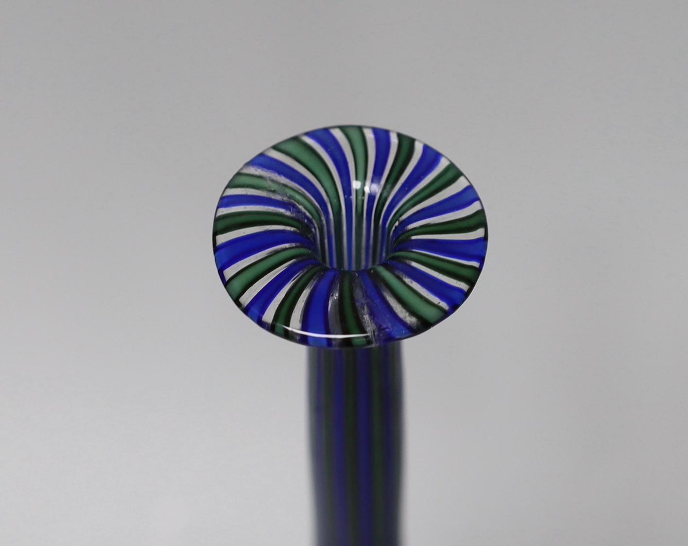 Two Venetian glass vases, a blue and green Murano bottle vase and a small Venini style vase with a blue rim, tallest 35cm